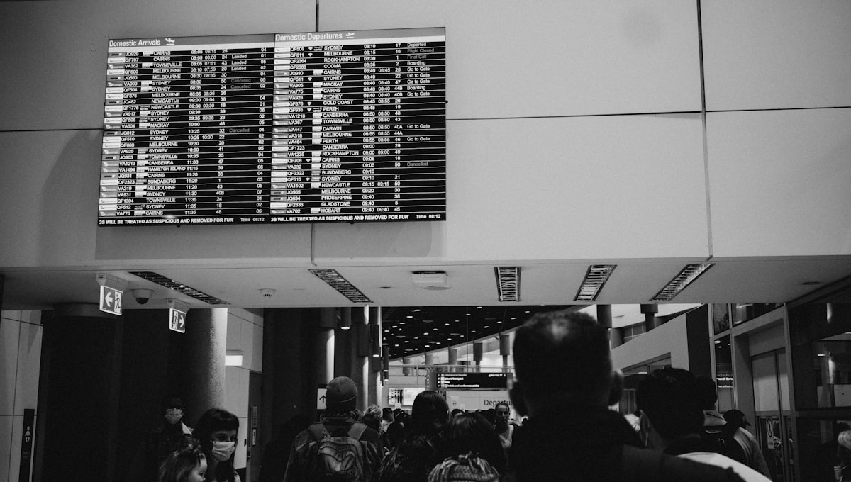 Airport gate with passengers waiting during delay or rebooking situation