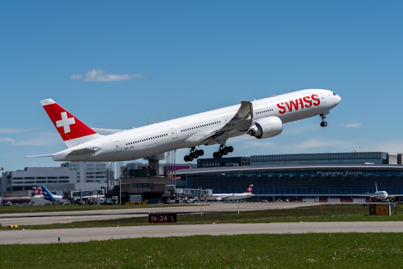 a large passenger jet taking off from an airport runway
